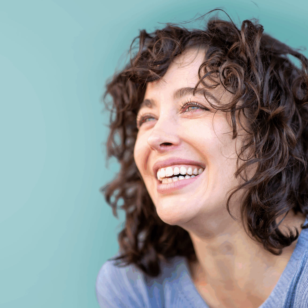 A woman smiling with confidence
